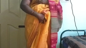 desi  indian horny tamil telugu kannada malayalam hindi cheating wife vanitha wearing orange colour saree  showing big boobs and shaved pussy press hard boobs press nip rubbing pussy masturbation